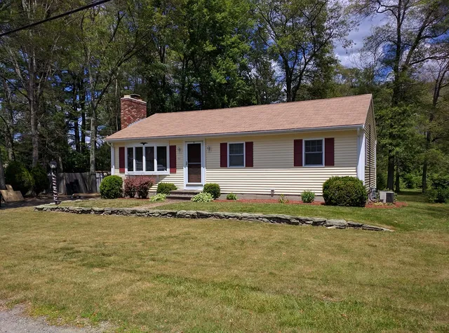 Ranch home with newly installed siding and white trim