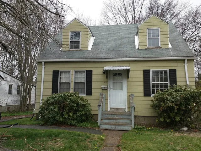 Cape home with dormers before its exterior update
