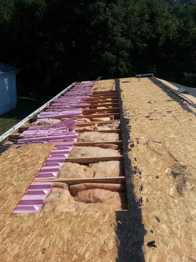 Ice and water shield installed along the edge of a new roof deck
