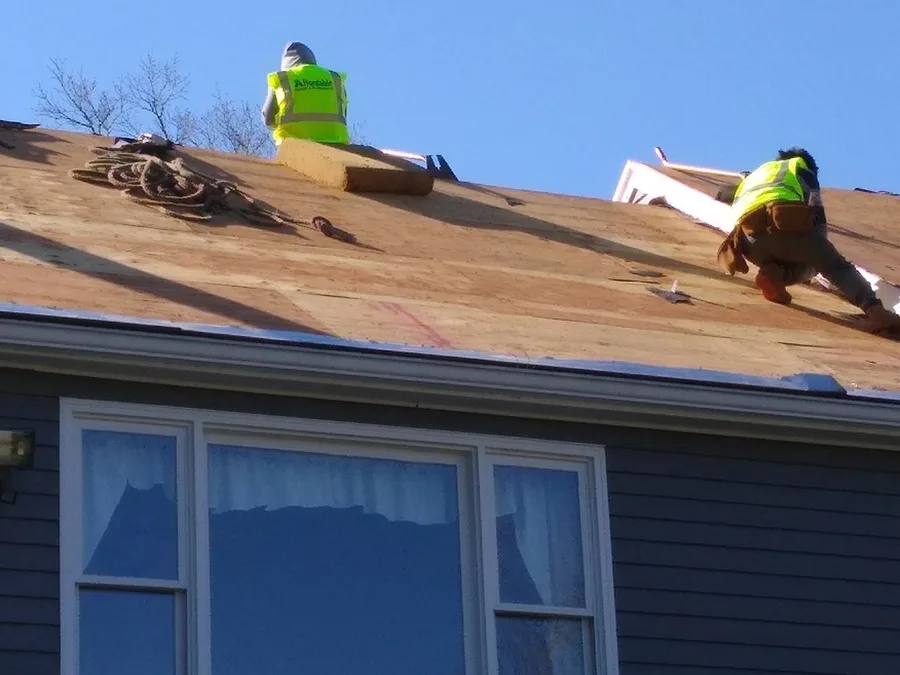 Affordable, LLC crew installing a new roof